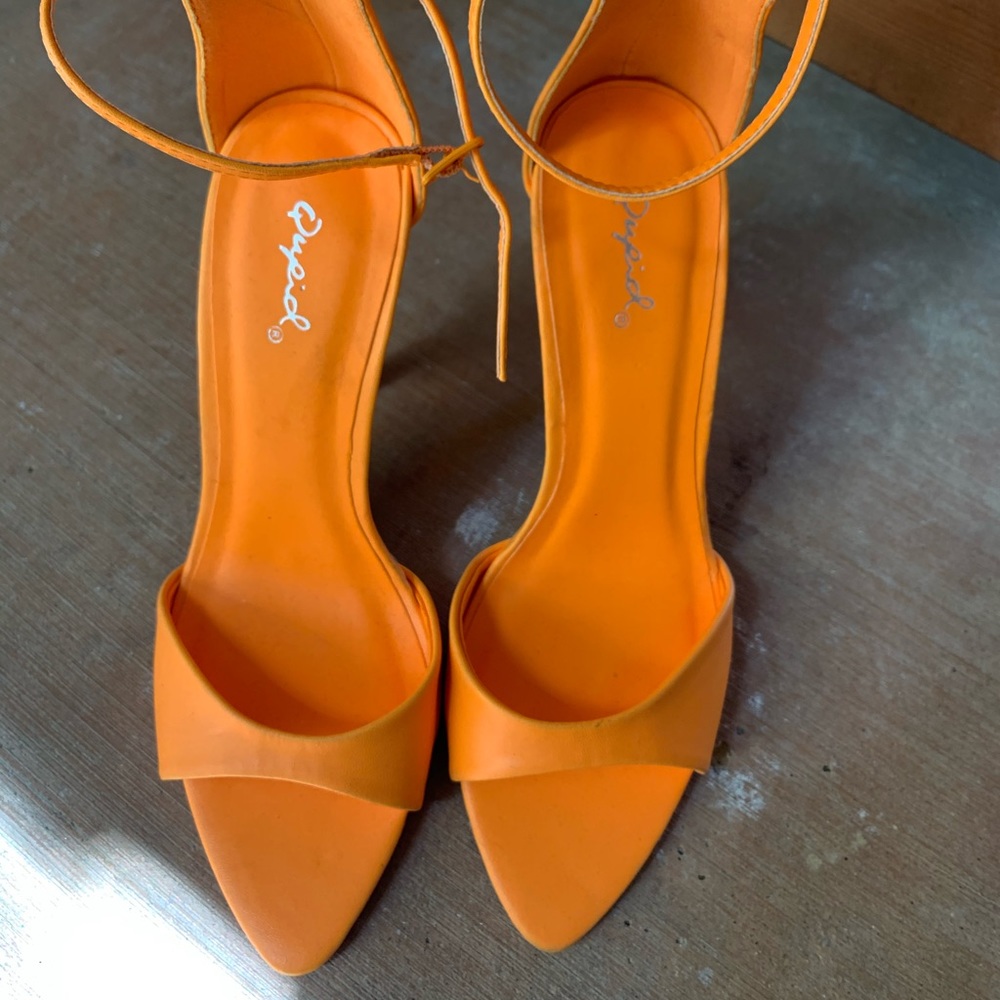 Bright orange sandal heels
